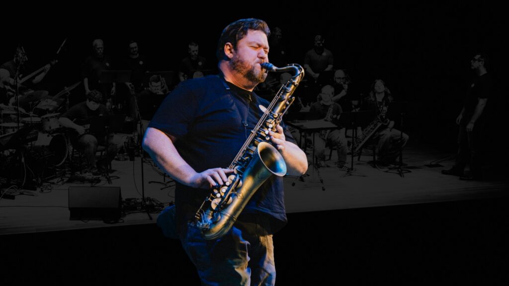 A man playing a saxophone